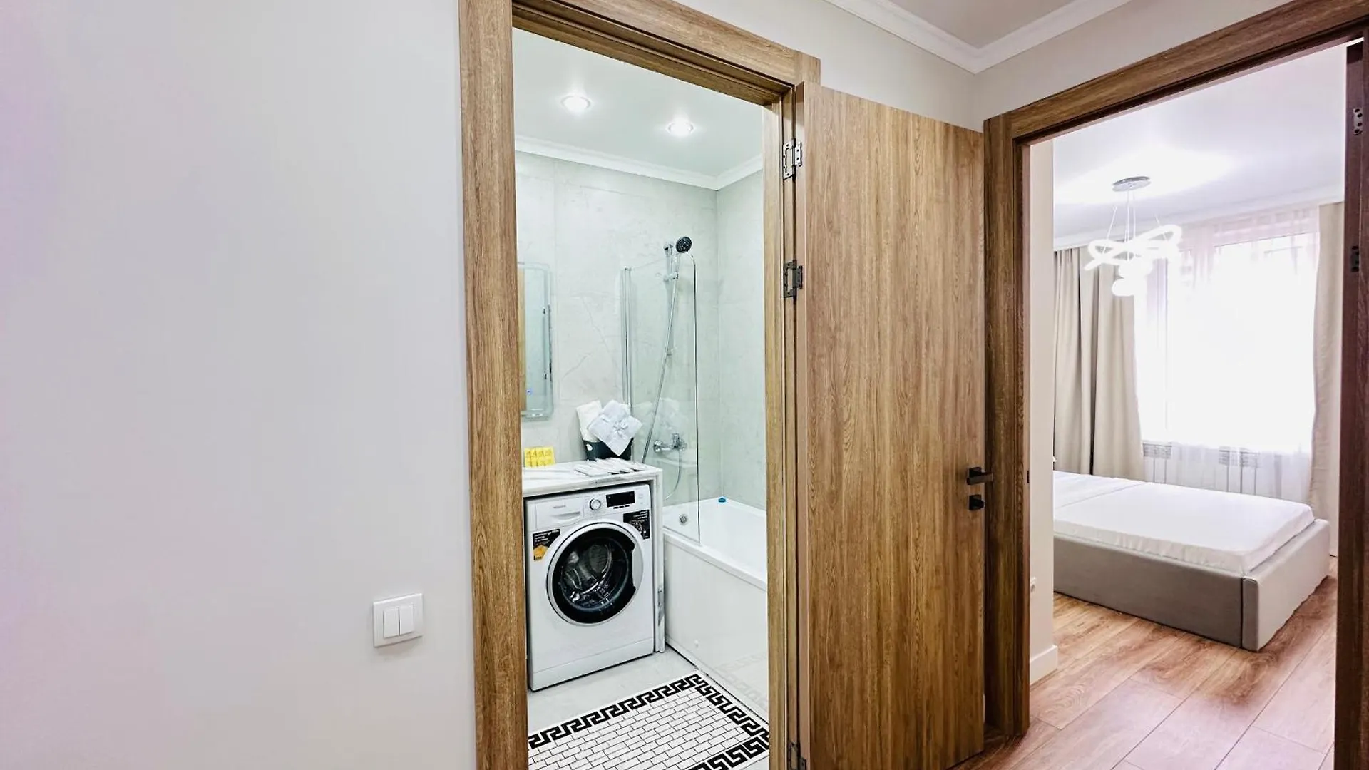 Rams City Almaty Apartment